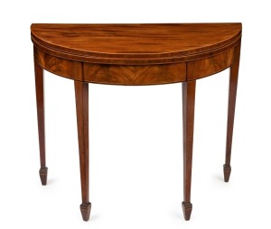 A George III Hepplewhite demi-lune fold-over tea table, flame mahogany with satinwood and ebony string inlay, square form tapering legs with original spade feet, circa 1790, 73cm high, 92cm wide, 45cm (extends to 90cm) deep