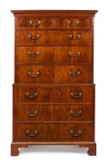 A George I English chest on chest, walnut and pine with cockbeaded trim, concave moulded base rail, attractive cast brass drop handles (hand made but of a later period) and original brass escutcheons, circa 1725, 170cm high, 98cm wide, 51cm deep
