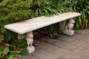 An antique Italian carved marble garden seat, 19th century, 51cm high, 180cm wide, 50cm deep