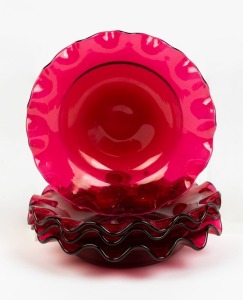 A set of four antique English ruby glass dishes with frilled rims, 19th century, 15.5cm diameter