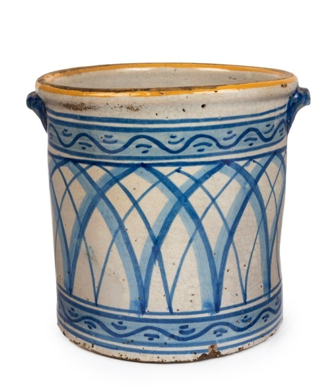 An antique Continental majolica earthenware pot with blue and white lattice pattern and orange glazed rim, 17th/18th century, 23cm high, 26cm wide