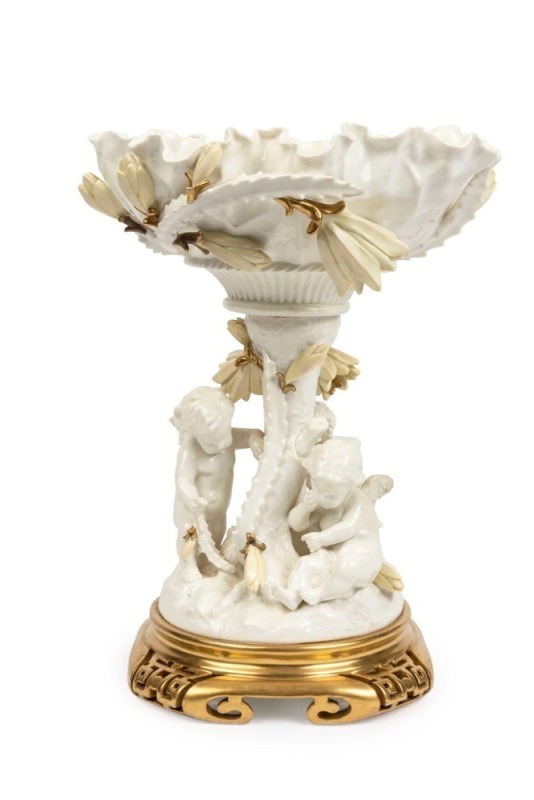MOORE BROTHERS antique English figural porcelain compote with cherub figures and cactus flowers on gilded base, 19th century, pink factory mark to base, 33cm high