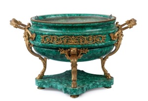 A superb antique French wine cooler, carved malachite with ornate ormolu mounts, adorned with face masks and hoof supports, original tin liner and attractive scrolling pierced and fretted foliate mounts to sides. Most likely made for the Russian market, m