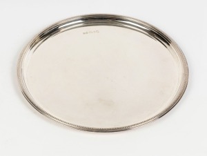 Queen Elizabeth II jubilee English sterling silver circular salver with beaded edge, stamped "B.E.S. & Co." of Sheffield, circa 1977, 31cm diameter, 770 grams
