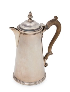 George III English sterling silver coffee pot with broad circular base adorned with fine gadrooning. Original fancy-shaped wooden handle with silver mounts. Undecorated cylindrical tapering sides to a circular overhanging lid with a double domed centre, a