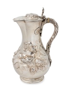 An attractive antique English sterling silver water jug with repousse and applied foliate decoration. Made by Robert Hennell of London, circa 1854, 29cm high, 870 grams