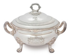 George III English sterling silver circular soup tureen. Heavy gadrooned edge with scallop shell and foliate motifs to the quarters. Elegant and simple baluster shape to the body which is raised on four cast lion paw feet with acanthus leaf mounts. Emblazoned with engraved armorial crest. Made by Richard Sibley I, of London, circa 1812, an imposing and impressive 27cm high, 38cm wide, 4710 grams