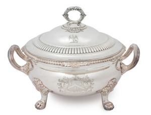 George III English sterling silver circular soup tureen. Heavy gadrooned edge with scallop shell and foliate motifs to the quarters. Elegant and simple baluster shape to the body which is raised on four cast lion paw feet with acanthus leaf mounts. Emblaz