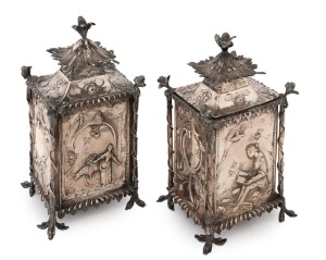 A stunning pair of George III sterling silver Chippendale pagoda shaped tea caddies in the chinoiserie style. Made by John Marshall of London, circa 1764. 17cm high, 746 grams total