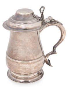 A George II English sterling silver covered tankard of baluster form. Made by William Shaw II & William Preist of London, circa 1759, 19.5cm high, 736 grams 
