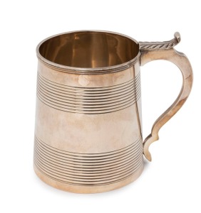 George III English sterling silver straight-sided ale mug with fine reeded decorations in two bands to the sides, solid loop handle, and simple foliate thumb piece to top. Made by Charles Fox I of London, circa 1814, 11.5cm high, 306 grams.