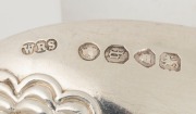 An antique English pair of "Coburg" pattern sterling silver stuffing spoons; each with hallmarks to the underside of the bowl together with scallop-shell decoration. Stamped "W.R.S.", made in London, circa 1857, 30cm long, 422 grams total - 2