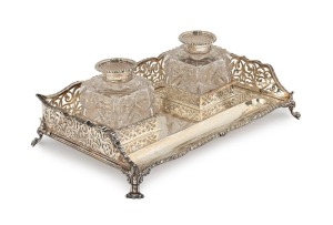 An antique English sterling silver desk set with original silver lidded cut crystal inkwells. By Thomas Barnard of London, circa 1893, 26cm wide, 616 grams silver weight