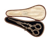 An antique pair of sterling silver grape scissors with delicate grapevine decoration to the handles. Original Garrards of Regent Street plush lined case. Made by Francis Higgins II of London, circa 1863, 19cm long, 144 grams. - 2