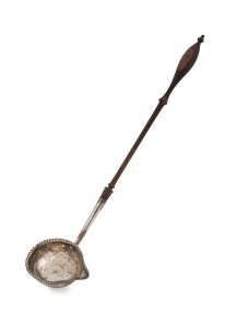 HESTER BATEMAN fine antique English sterling silver toddy ladle with deep bowl, beaded edge decoration and silver mounting shaft; fitted to the original delicately turned ebonized fruitwood handle. Maker's mark for Hester Bateman of London, circa 1782, 34