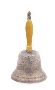 A sterling silver table bell with turned ivorine handle terminating in an acorn finial. By Thomas Bradbury & Sons of Sheffield, circa 1922. 12cm high