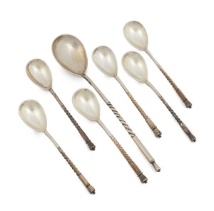 Russian silver set of six coffee spoons with spiral twist handles and octagonal finials; together with a larger similar designed sugar spoon, circa 1880, (7 items), the sugar spoon 15cm long, 86 grams total