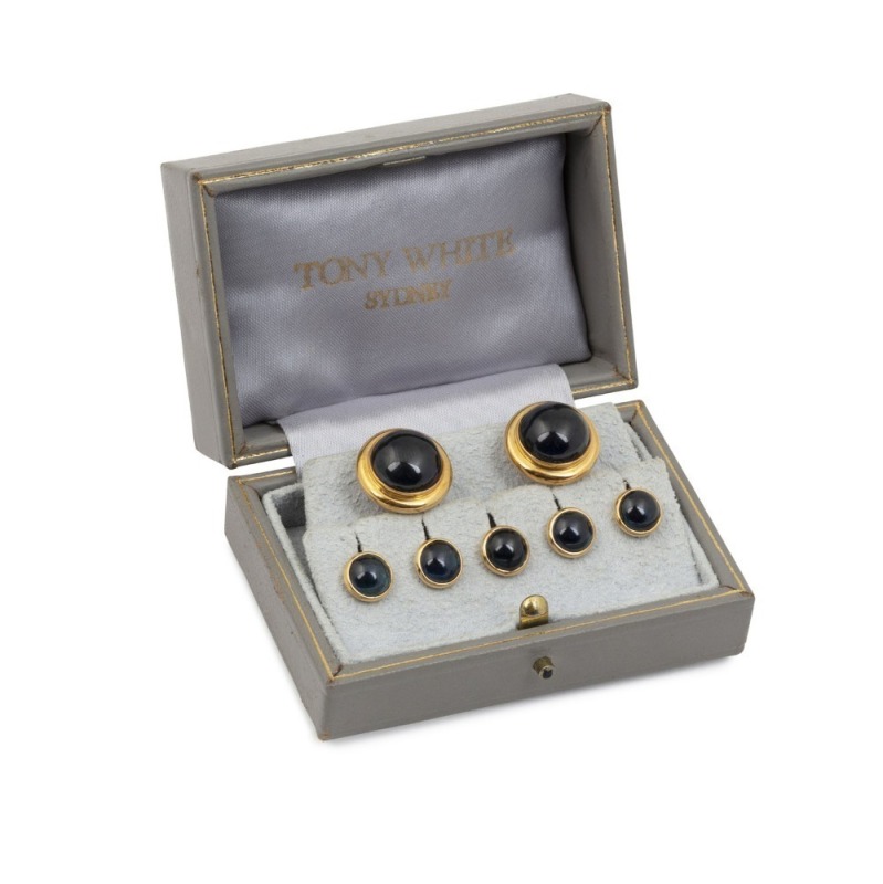 TONY WHITE, Sydney: 18ct gold cuff-links set with cabochon sapphires, together with the matching set of five shirt studs. 