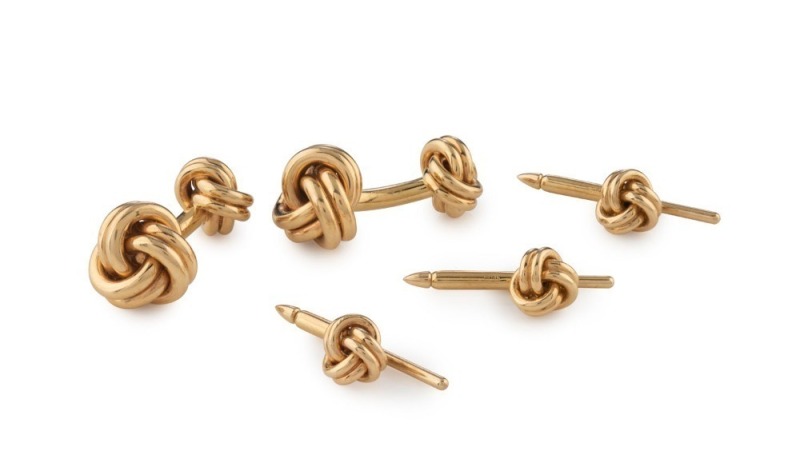 TIFFANY & CO pair of 14ct gold double knot-design cufflinks, together with three matching dress-shirt studs. (5 items). 28 grams total