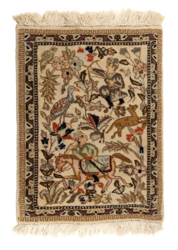 Small hand-knotted wool rug depicting a hunting scene, 66 x 51cm.