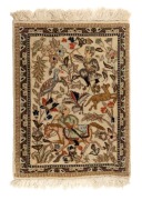 Small hand-knotted wool rug depicting a hunting scene, 66 x 51cm.