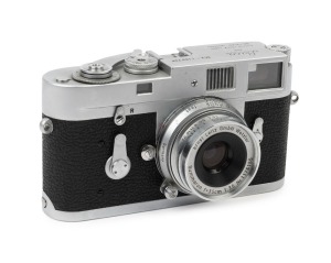 LEITZ: Leica Model M2 [#1163706], with Summaron f3.5 35mm lens [#1176155]. Leica body cap present.