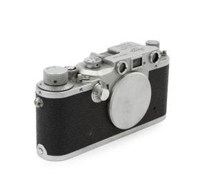 LEITZ: Leica Model IIIc Luftwaffe Eigentum [#381458] with Fl. No. 38079 on top plate, Luftwaffe insignia on rear of top plate has been removed. Aluminium body cap present.