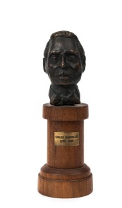 OSKAR BARNACK commemorative cast bronze bust on wooden plinth with plaque, 17cm overall height.