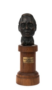 OSKAR BARNACK commemorative cast bronze bust on wooden plinth with plaque, 17cm overall height.