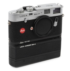 LEITZ Canada: Leica Model M4-P 70th Anniversary Prototype [#1619452], 1983, with Summicron-M f2 50mm lens [#3166427] (still in sealed box) and Leica winder M4-2 with box and instructions. Camera body L235 of 2500. With original box and paperwork.