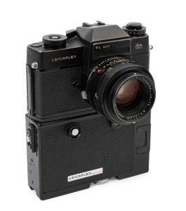 LEITZ: Leica Model Leicaflex SL Mot Black [#1372621], 1974, with Summilux-R f4 50mm lens [#2493110]. Leicaflex Motor Drive attached to base.