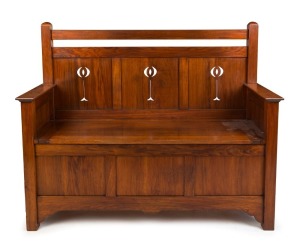 An Australian Arts & Crafts blackwood hall seat with lift-top compartment, early 20th century, 106cm high, 123cm wide, 46cm deep