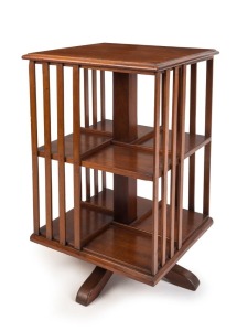 An antique cedar revolving bookstand of rare petite proportions, circa 1900, 76cm high, 45cm wide, 45cm deep