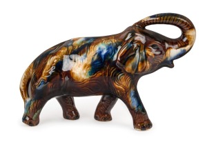 HUNTLY POTTERY elephant statue with mottled glaze, stamped "Huntly Pottery", 21cm high, 31cm long