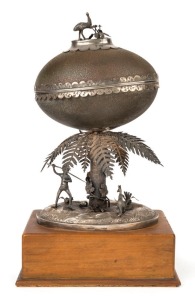HENRY YOUNG (Melbourne) fine Australian silver emu egg casket, adorned with scene of Aboriginal hunter, kangaroo, emu and foliage, 19th century, stamped "H. Young STG SILVER", 29cm high overall