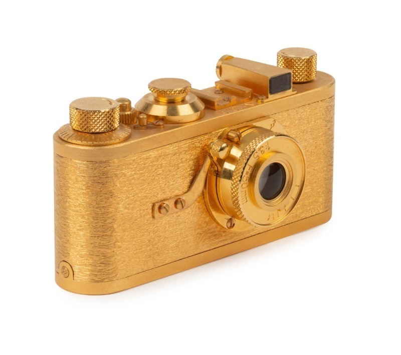 LEITZ: Leica Model I 24 Carat Gold Plated Miniature Replica [#1010], 1993, with original box and Certificate of Authenticity.