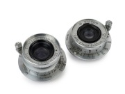 LEITZ:&nbsp;Elmar&nbsp;35mm f3.5 lens&nbsp;[#616237] and a&nbsp;Summaron 35mm f3.5 lens [#1221331]. (2 items).