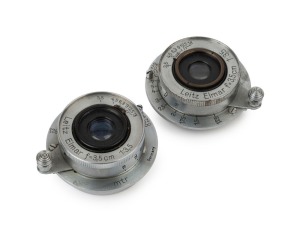 LEITZ: Elmar 35mm f3.5 lens [#470183] and an Elmar 35mm f3.5 lens [#654536] with metal rear cap. (2 items).