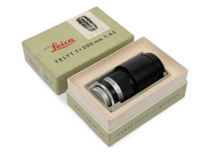 LEITZ: Telyt 200mm f4.5 telephoto screw mount lens [#1501100], 1957, with rear metal cap in fitted original Leitz box. Together with Leitz removable lens hood [TNGOO].