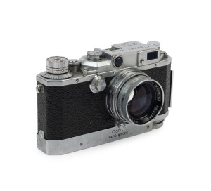 Canon Model IVSB camera [#78887], 1952, with Serenar 50mm f1.9 lens [#31744] and a Canon Rapid Winder [#13685].