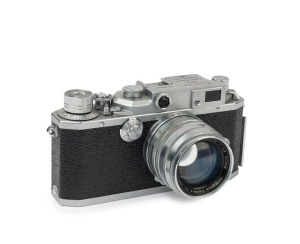 Canon Model IIF rangefinder camera <E.P>, 1955 [#151590; model identified on loading diagram] with Serenar f1.8 50mm lens [#63881] and Canon ERC with straps.