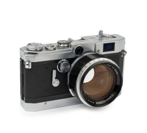 Canon rangefinder camera Model VT deluxe, 1957 [#549611] with Canon 50mm f1.2 lens [#25379] and Canon lens hood.