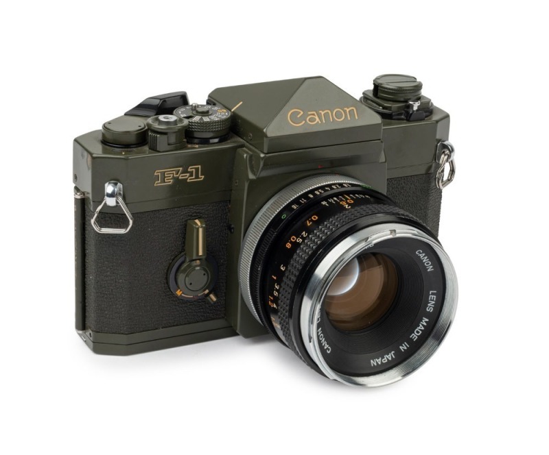 Canon F-1n (olive body) SLR camera, [#575093] with Canon FD 50mm f1.8 lens [#333993].