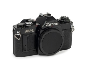 Canon AV-1 SLR camera body, 1979 [#923728] with black finish.