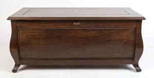 A bombe shaped silky oak blanket box by R.L. CORDON Art Furniture of Brisbane, early 20th century, 45cm high, 103cm wide, 50cm deep