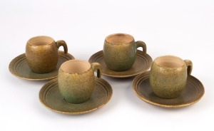 PAM HALLANDAL set of four pottery cups and saucers, incised "Pam Hallandal, 1949", the saucers 14cm diameter