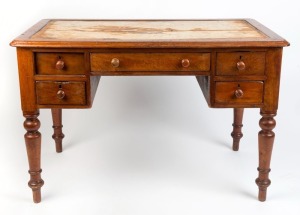 A Colonial Australian cedar five drawer desk with turned legs, circa 1860, leather insert top removed, 76cm high, 116cm wide, 67cm deep