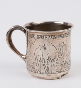 An Australian sterling silver christening mug with Noah's Ark scene depicting two kangaroos, engraved "The Animals Marched In Two By Two", stamped "Sterling", ​​​​​​​7cm high, 9.5cm wide - 2