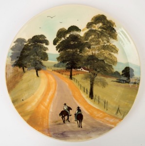 MARTIN BOYD pottery charger with horse riders in landscape, incised "Martin Boyd, Australia", 35.5cm diameter