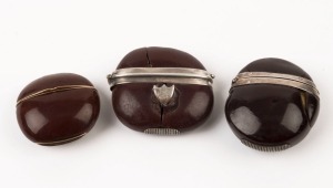 Three antique Australian burra nut vestas, one with rose gold mount, the others with silver mounts, 19th century, the largest 5cm high